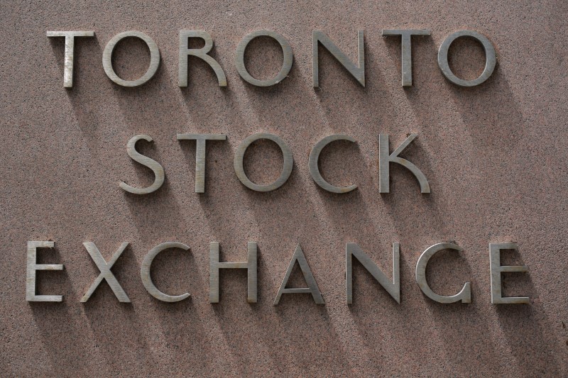 TSX edges higher on commodities boost