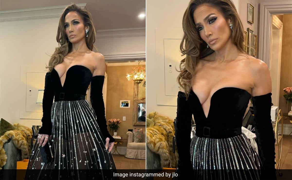 Jennifer Lopez Channels Her Best Leo Style In A Plunging Black And Silver Zodiac-Themed Gown
