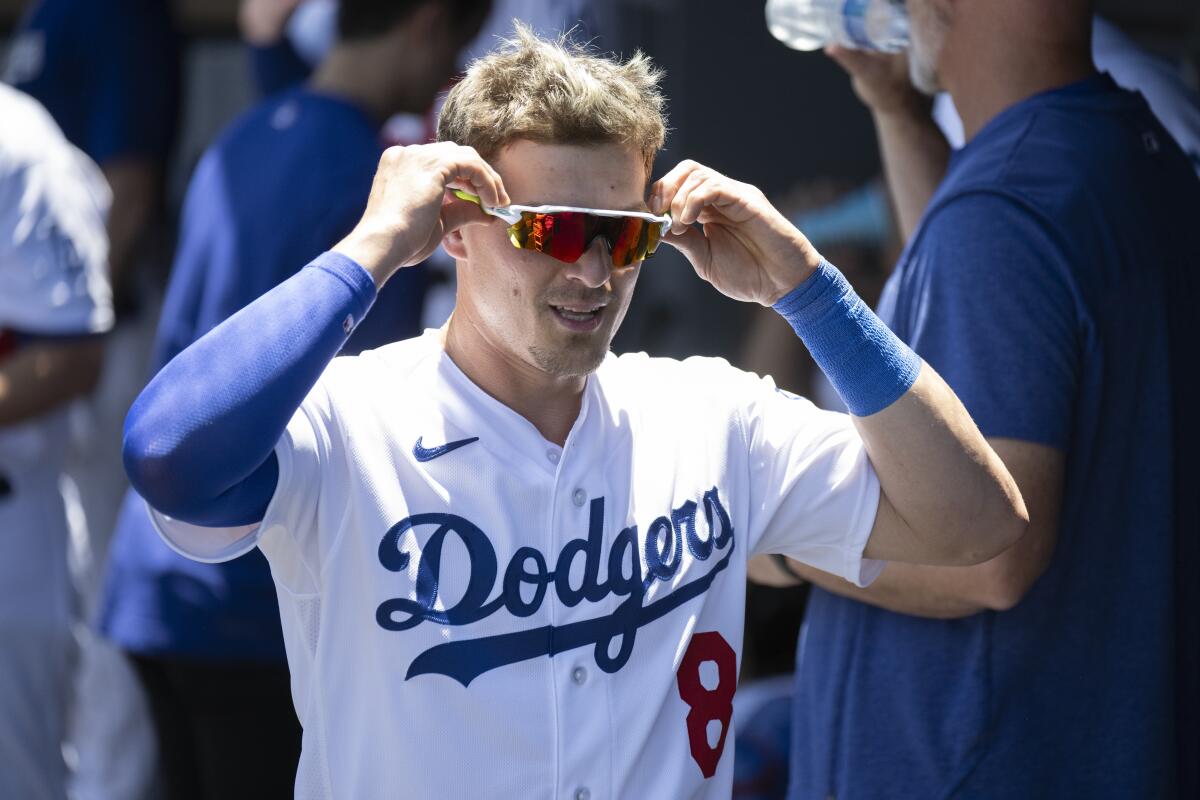 The Dodgers' Kiké Hernández wears his sunglasses before a game against the Toronto Blue Jays on July 26, 2023.