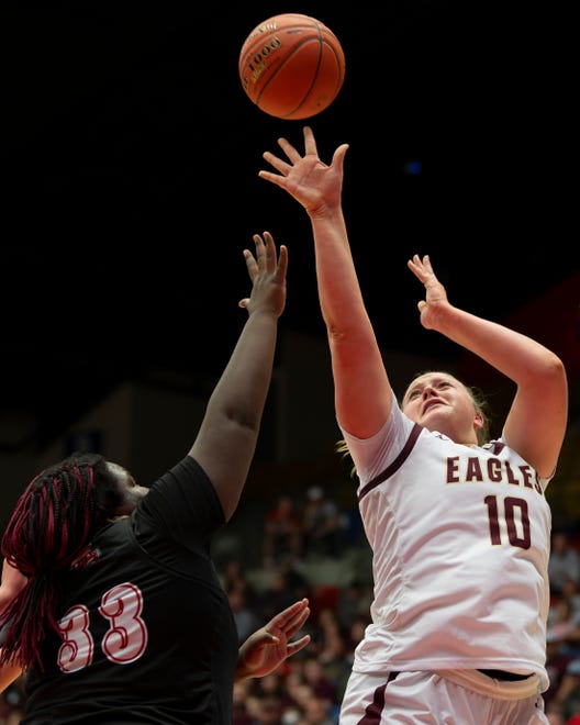 Silver Lake's Makenzie McDaniel (10) shoots the ball against Hesston's Kyiara White (33) during State Basketball Championships March. 9, 2024 at Hutchinson Sports Arena.