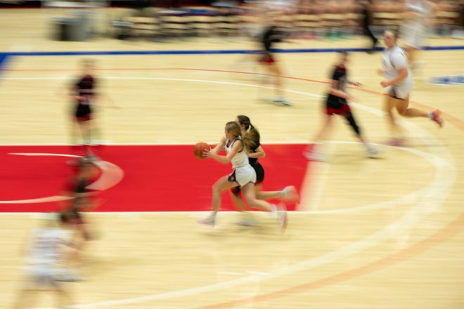 Silver Lake's Kailyn Hanni (4) dribbles down the court during State Basketball Championships March. 9, 2024 at Hutchinson Sports Arena.