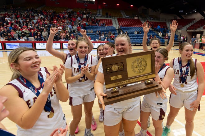 Silver Lake celebrates after defeating Hesston during State Basketball Championships March. 9, 2024 at Hutchinson Sports Arena.