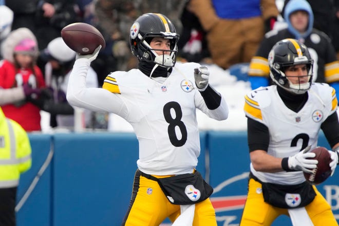 Pittsburgh Steelers quarterback Kenny Pickett (8) throws the ball against the Buffalo Bills during an NFL wild-card playoff football game, Monday, Jan. 15, 2024 in in Orchard Park, NY.