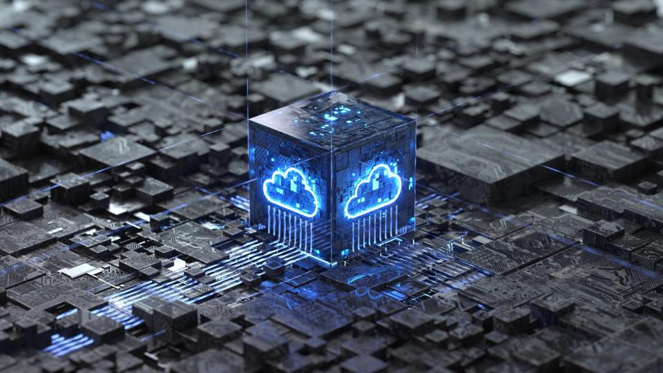 A blue illuminated cloud on the side of a processor that's completely surrounded by circuitry.