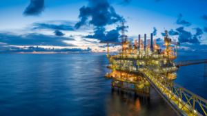 Panorama of Oil and Gas central processing platform in twilight, offshore hard work occupation twenty four working hours. Best oil stocks to buy. Oil & Gas Stocks to Avoid