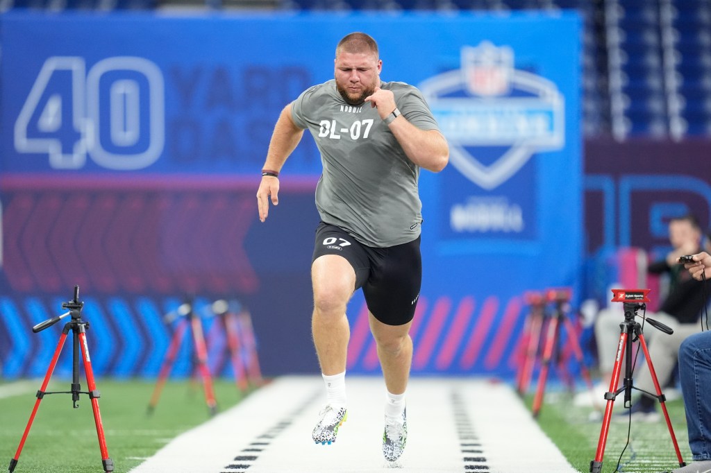 Florida State defensive lineman Braden Fiske runs the 40-yard dash at the NFL football scouting combine in Indianapolis.