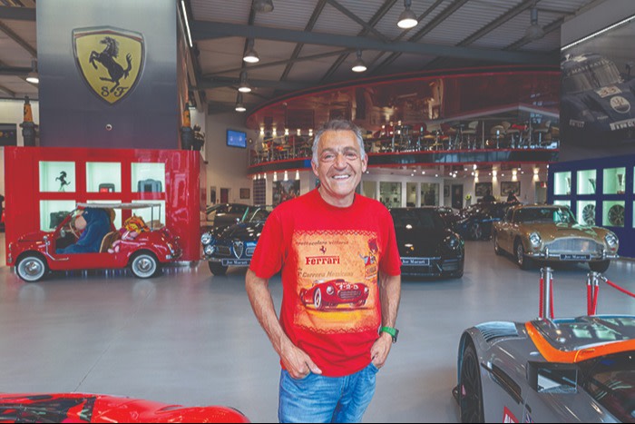 High-end car dealer Joe Macari in his London showroom